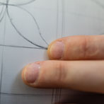 Rhian Malin decorating a mandala bottle in her workshop 2019